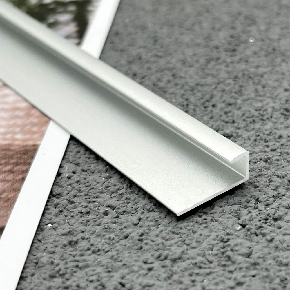 Thickened aluminum alloy wall panel trim strip